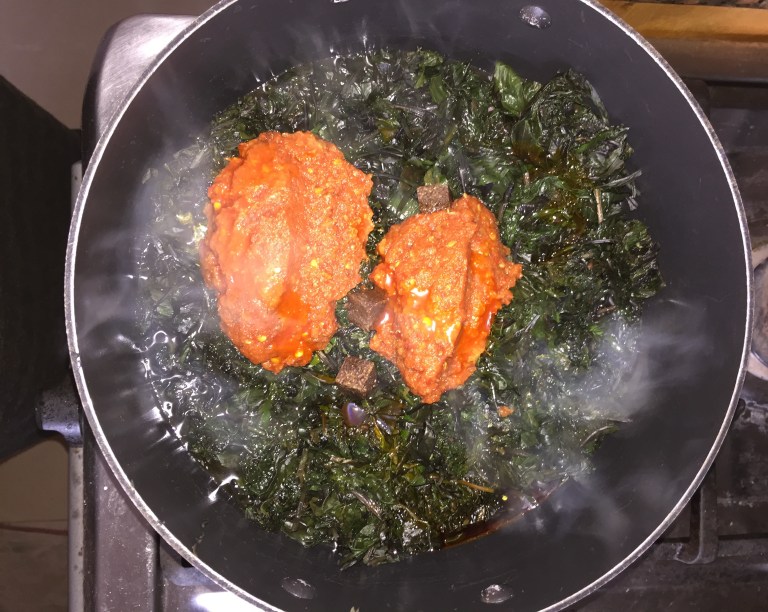 Tomato and pepper paste, seasoning cubes and palm oil.